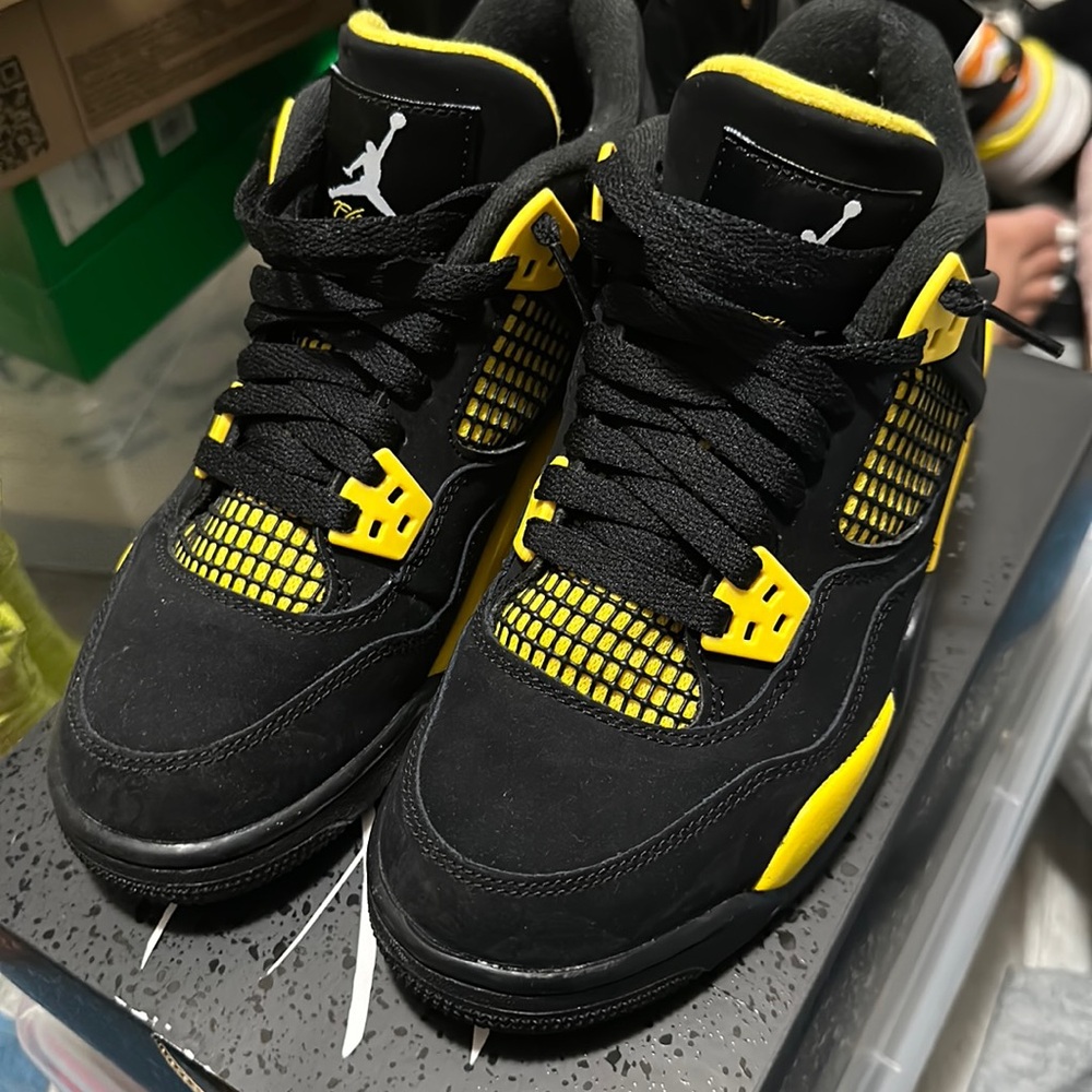 Retro Jordan 4s black and Yellow